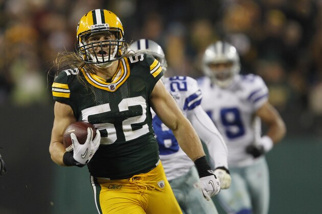 Green Bay Packers' Clay Matthews runs back an interception for a touchdown during the second half of an NFL football game against the Dallas Cowboys Sunday, Nov. 7, 2010, in Green Bay, Wis. The Packers won 45-7. (AP Photo/Mike Roemer)
