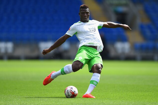 CARDIFF, WALES - AUGUST 02:  VFL Wolfburg player Junior Malanda in action during the friendly match between Cardiff City and VFL Wolfsburg at Cardiff City Stadium on August 2, 2014 in Cardiff, Wales.  (Photo by Stu Forster/Getty Images)