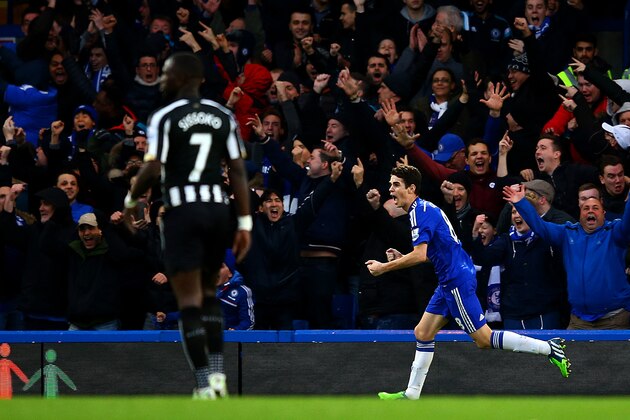 LONDON, ENGLAND - JANUARY 10:  Oscar of Chelsea celebrates after scoring the opening goal during the Barclays Premier League match between Chelsea and Newcastle United at Stamford Bridge on January 10, 2015 in London, England.  (Photo by Richard Heathcote/Getty Images)