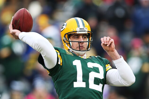 GREEN BAY, WI - DECEMBER 28:  Aaron Rodgers #12 of the Green Bay Packers warms up prior to their game against the Detroit Lions at Lambeau Field on December 28, 2014 in Green Bay, Wisconsin.  (Photo by Chris Graythen/Getty Images)
