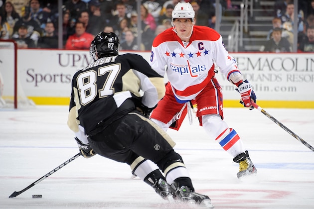 PITTSBURGH, PA - MARCH 19:  Sidney Crosby #87 of the Pittsburgh Penguins tries to get past the defense of Alex Ovechkin #8 of the Washington Capitals on March 19, 2013 at Consol Energy Center in Pittsburgh, Pennsylvania.  (Photo by Joe Sargent/NHLI via Getty Images)
