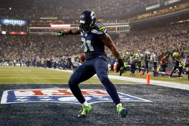 SEATTLE, WA - JANUARY 10: Kam Chancellor #31 of the Seattle Seahawks celebrates after scoring a 90 yard touchdown off of an interception in the fourth quarter thrown by Cam Newton #1 of the Carolina Panthers iduring the 2015 NFC Divisional Playoff game at CenturyLink Field on January 10, 2015 in Seattle, Washington. (Photo by Otto Greule Jr/Getty Images) SEATTLE, WA - JANUARY 10: Kam Chancellor #31 of the Seattle Seahawks celebrates after scoring a 90 yard touchdown off of an interception in the fourth quarter thrown by Cam Newton #1 of the Carolina Panthers iduring the 2015 NFC Divisional Playoff game at CenturyLink Field on January 10, 2015 in Seattle, Washington. (Photo by Otto Greule Jr/Getty Images)