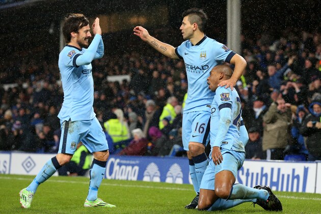 LIVERPOOL, ENGLAND - JANUARY 10:  Fernandinho of Manchester City celebrates with teammates David Silva and Sergio Aguero after scoring the opening goal during the Barclays Premier League match between Everton and Manchester City at Goodison Park on January 10, 2015 in Liverpool, England.  (Photo by Alex Livesey/Getty Images)