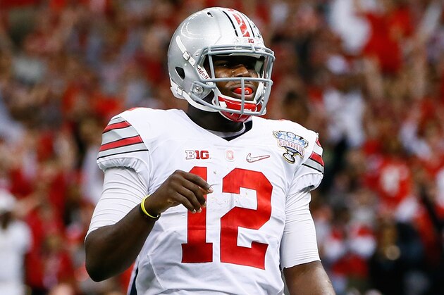 NEW ORLEANS, LA - JANUARY 01:  Cardale Jones #12 of the Ohio State Buckeyes reacts after a two point conversion in the fourth quarter against the Alabama Crimson Tide during the All State Sugar Bowl at the Mercedes-Benz Superdome on January 1, 2015 in New Orleans, Louisiana.  (Photo by Kevin C. Cox/Getty Images)