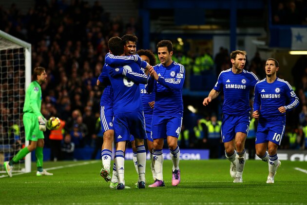 LONDON, ENGLAND - JANUARY 10:  Diego Costa of Chelsea celebrates with team-mates after scoring his team's second goal during the Barclays Premier League match between Chelsea and Newcastle United at Stamford Bridge on January 10, 2015 in London, England.  (Photo by Richard Heathcote/Getty Images)