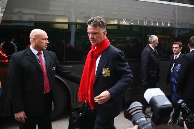YEOVIL, ENGLAND - JANUARY 04:  Louis Van Gaal the manager of Manchester United is ushered by stewards as he arrives ahead of the FA Cup Third Round match between Yeovil Town and Manchester United at Huish Park on January 4, 2015 in Yeovil, England.  (Photo by Michael Steele/Getty Images)