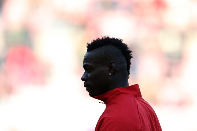 Liverpool's Mario Balotelli warms up ahead of their English Premier League soccer match against Sunderland at the Stadium of Light, Sunderland, England, Saturday, Jan. 10, 2015. (AP Photo/Scott Heppell)