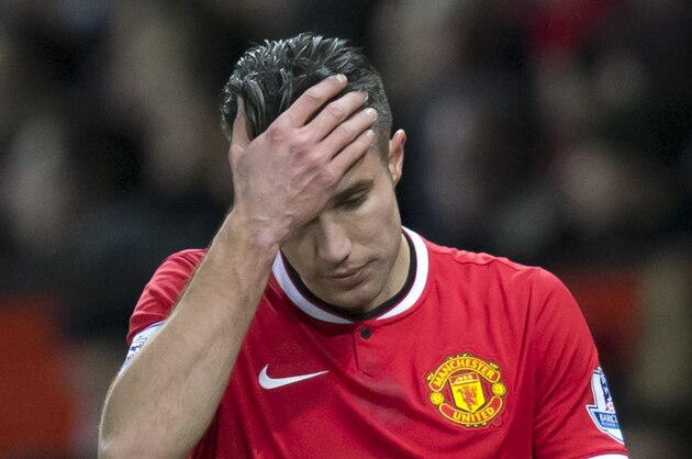 Manchester United's Robin van Persie walks from the pitch after being substituted during his team's English Premier League soccer match between Manchester United and Southampton at Old Trafford Stadium, Manchester, England, Sunday Jan. 11, 2015. (AP Photo/Jon Super)