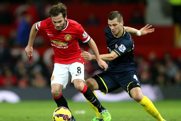 MANCHESTER, ENGLAND - JANUARY 11: Juan Mata of Manchester United battles for the ball with Morgan Schneiderlin of Southampton during the Barclays Premier League match between Manchester United and Southampton at Old Trafford on January 11, 2015 in Manchester, England. (Photo by Clive Mason/Getty Images) MANCHESTER, ENGLAND - JANUARY 11: Juan Mata of Manchester United battles for the ball with Morgan Schneiderlin of Southampton during the Barclays Premier League match between Manchester United and Southampton at Old Trafford on January 11, 2015 in Manchester, England. (Photo by Clive Mason/Getty Images)