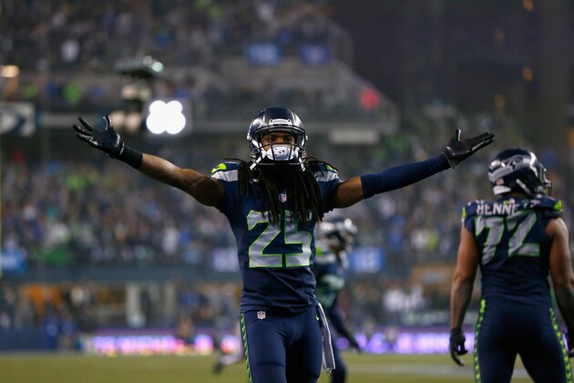 SEATTLE, WA - JANUARY 10:   Richard Sherman #25 of the Seattle Seahawks reacts after a play against the Carolina Panthers during the 2015 NFC Divisional Playoff game at CenturyLink Field on January 10, 2015 in Seattle, Washington.  (Photo by Jonathan Ferrey/Getty Images)