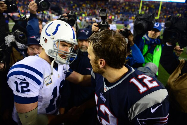 Jan 11, 2014; Foxborough, MA, USA; New England Patriots quarterback Tom Brady (12) shakes hands with Andrew Luck (12) after the 2013 AFC divisional playoff football game at Gillette Stadium. Mandatory Credit: Andrew Weber-USA TODAY Sports