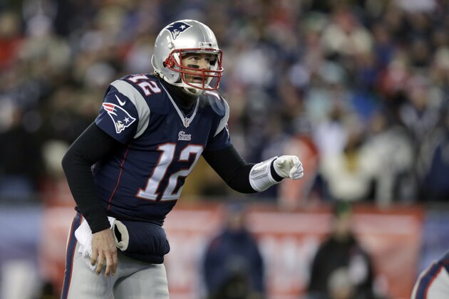 New England Patriots quarterback Tom Brady (12) calls signals at the line in the first half of an NFL divisional playoff football game against the Baltimore Ravens Saturday, Jan. 10, 2015, in Foxborough, Mass. (AP Photo/Charles Krupa)