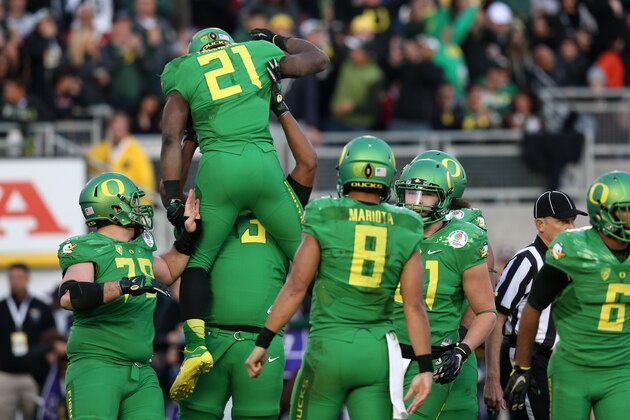 PASADENA, CA - JANUARY 01:  Running back Royce Freeman #21 of the Oregon Ducks celebrates his touchdown in the third quarter of the College Football Playoff Semifinal against the Florida State Seminoles at the Rose Bowl Game presented by Northwestern Mutual at the Rose Bowl on January 1, 2015 in Pasadena, California.  (Photo by Stephen Dunn/Getty Images)