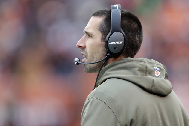 FILE - In this Nov. 16, 2014 file photo, Cleveland Browns offensive coordinator Kyle Shanahan watches from the bench during an NFL football game against the Houston Texans in Cleveland. A person familiar with the decisions says Shanahan and quarterbacks coach Dowell Loggains will not be returning to the team. (AP Photo/Tony Dejak, File)