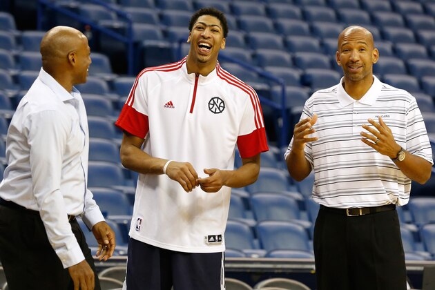 NEW ORLEANS, LA - OCTOBER 16:  Head coach Monty Williams (L) and General Manager Dell Demps (R) of the New Orleans Pelicans share a laugh with Anthony Davis (C) during an open practice for fans on October 25, 2014 at the Smoothie King Center in New Orleans, Louisiana. NOTE TO USER: User expressly acknowledges and agrees that, by downloading and or using this Photograph, user is consenting to the terms and conditions of the Getty Images License Agreement. Mandatory Copyright Notice: Copyright 2014 NBAE (Photo by Layne Murdoch/NBAE via Getty Images