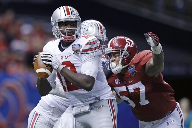 Alabama linebacker D.J. Pettway (57) sacks Ohio State quarterback Cardale Jones (12) in the second half of the Sugar Bowl NCAA college football playoff semifinal game, Thursday, Jan. 1, 2015, in New Orleans. (AP Photo/Brynn Anderson)