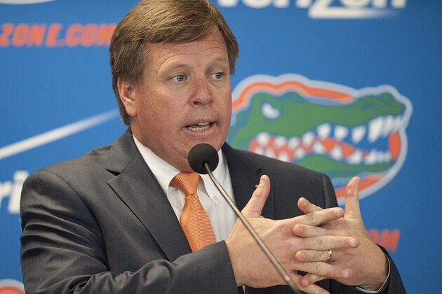 Jim McElwain, Florida's new head football coach, speaks to the media during an NCAA college football news conference, Saturday, Dec. 6, 2014, in Gainesville, Fla.  (AP Photo/Phil Sandlin)
