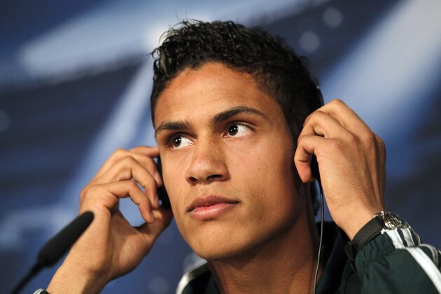 Real Madrid's Raphael Varane from France listens during a news conference in Madrid, Spain, Tuesday, April 2, 2013. Real Madrid will play Galatasaray Wednesday in a quarterfinal first leg Champions League soccer match. (AP Photo/Andres Kudacki) Real Madrid's Raphael Varane from France listens during a news conference in Madrid, Spain, Tuesday, April 2, 2013. Real Madrid will play Galatasaray Wednesday in a quarterfinal first leg Champions League soccer match. (AP Photo/Andres Kudacki)