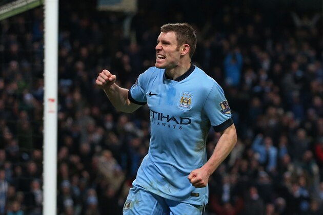 MANCHESTER, ENGLAND - JANUARY 04:  James Milner of Manchester City celebrates after scoring a goal to level the scores at 1-1 during the FA Cup Third Round match between  Manchester City and Sheffield Wednesday at Etihad Stadium on January 4, 2015 in Manchester, England.  (Photo by Jan Kruger/Getty Images)