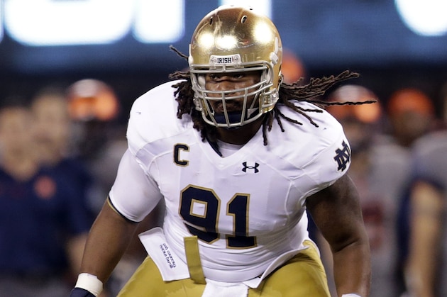 Notre Dame defensive lineman Sheldon Day defends against Syracuse during the first half of an NCAA college football game, Saturday, Sept. 27, 2014, in East Rutherford, N.J. (AP Photo/Julio Cortez)