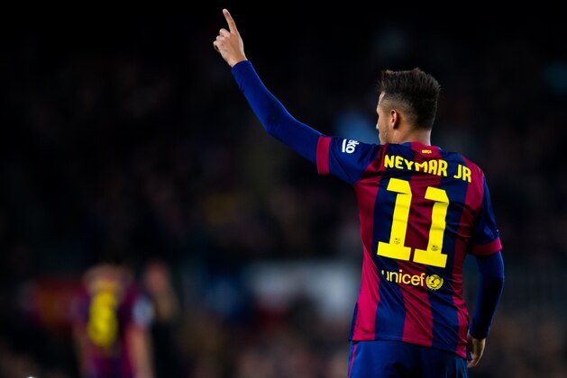 BARCELONA, SPAIN - JANUARY 11: Neymar Santos Jr of FC Barcelona celebrates after scoring the opening goal during the La Liga match between FC Barcelona and Club Atletico de Madrid at Camp Nou on January 11, 2015 in Barcelona, Spain. (Photo by Alex Caparros/Getty Images)