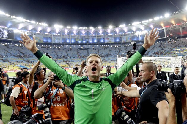 Germany's goalkeeper Manuel Neuer celebrates following their 1-0 victory over Argentina after the World Cup final soccer match between Germany and Argentina at the Maracana Stadium in Rio de Janeiro, Brazil, Sunday, July 13, 2014. (AP Photo/Natacha Pisarenko)