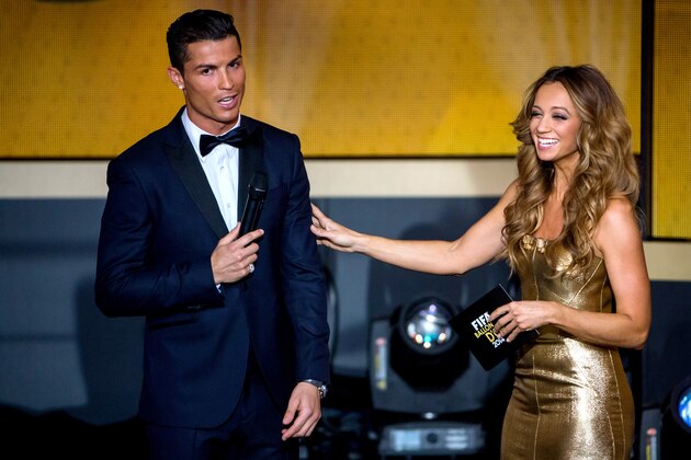 ZURICH, SWITZERLAND - JANUARY 12: Presenter Kate Abdo (R) speaks with Cristiano Ronaldo of Portugal and Real Madrid  during the FIFA Ballon d'Or Gala 2014 at the Kongresshaus on January 12, 2015 in Zurich, Switzerland. (Photo by Philipp Schmidli/Getty Images)