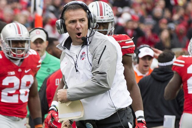 Nov 29, 2014; Columbus, OH, USA; Ohio State Buckeyes head coach Urban Meyer celebrates after a touchdown against the Michigan Wolverines at Ohio Stadium. Ohio State won the game 42-28. Mandatory Credit: Greg Bartram-USA TODAY Sports