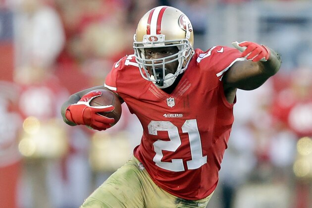SANTA CLARA, CA - DECEMBER 28:  Frank Gore #21 of the San Francisco 49ers runs with the ball against the Arizona Cardinals at Levi's Stadium on December 28, 2014 in Santa Clara, California.  (Photo by Ezra Shaw/Getty Images)