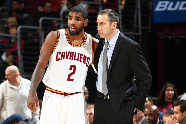 CLEVELAND, OH - DECEMBER 2:  Head coach David Blatt talks with Kyrie Irving #2 of the Cleveland Cavaliers during the game against the Milwaukee Bucks on December 2, 2014 at Quicken Loans Arena in Cleveland. Ohio.  NOTE TO USER: User expressly acknowledges and agrees that, by downloading and or using this Photograph, user is consenting to the terms and conditions of the Getty Images License Agreement. Mandatory Copyright Notice: Copyright 2014 NBAE (Photo by Nathaniel S. Butler/NBAE via Getty Images)
