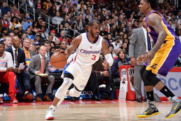 LOS ANGELES, CA - JANUARY 7:  Chris Paul #3 of the Los Angeles Clippers handles the ball against the Los Angeles Lakers on January 7, 2015 at STAPLES Center in Los Angeles, California. NOTE TO USER: User expressly acknowledges and agrees that, by downloading and/or using this Photograph, user is consenting to the terms and conditions of the Getty Images License Agreement. Mandatory Copyright Notice: Copyright 2014 NBAE (Photo by Andrew D. Bernstein/NBAE via Getty Images)