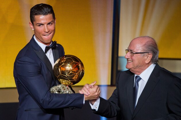 ZURICH, SWITZERLAND - JANUARY 12: FIFA Ballon d'Or winner Cristiano Ronaldo of Portugal and Real Madrid (L) shakes hands with FIFA President Joseph S. Blatter after the FIFA Ballon d'Or Gala 2014 at the Kongresshaus on January 12, 2015 in Zurich, Switzerland. (Photo by Philipp Schmidli/Getty Images)