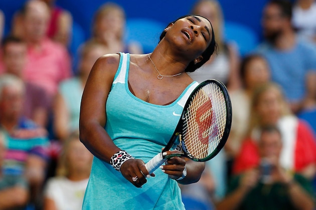 PERTH, AUSTRALIA - JANUARY 06:  Serena Williams of the United States reacts after dropping a point against Eugenie Bouchard of Canada in the women's singles match during day three of the Hopman Cup at Perth Arena on January 6, 2015 in Perth, Australia.  (Photo by Will Russell/Getty Images)