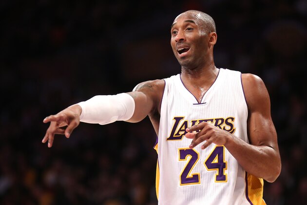 LOS ANGELES, CA - JANUARY 04:  Kobe Bryant #24 of the Los Angeles Lakers gives some on court coaching to a teammate during the game against the Indiana Pacers at Staples Center on January 4, 2015 in Los Angeles, California.The Lakers won 88-87.  NOTE TO USER: User expressly acknowledges and agrees that, by downloading and or using this photograph, User is consenting to the terms and conditions of the Getty Images License Agreement.  (Photo by Stephen Dunn/Getty Images)