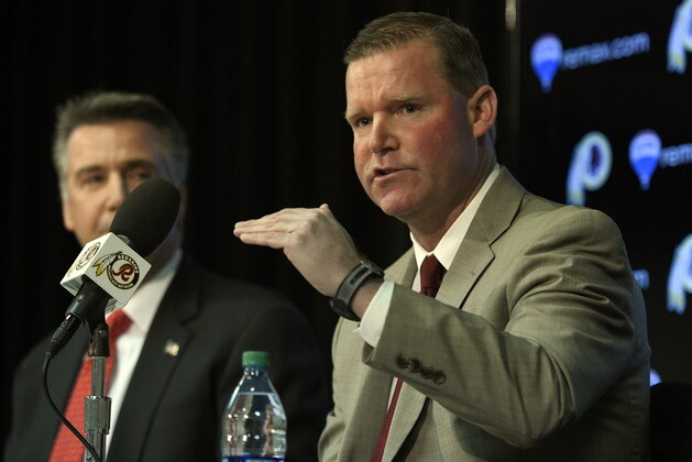Scot McCloughan, right, speaks during an NFL football press conference where he was introduced as the Washington Redskins new general manager, Friday, Jan. 9, 2015, in Ashburn, Va. At left is Washington Redskins president Bruce Allen. (AP Photo/Nick Wass)