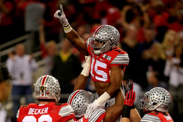 ARLINGTON, TX - JANUARY 12:  Running back Ezekiel Elliott #15 of the Ohio State Buckeyes celebrates after scoring a 33 yard touchdown in the first quarter against the Oregon Ducks during the College Football Playoff National Championship Game at AT&T Stadium on January 12, 2015 in Arlington, Texas.  (Photo by Jamie Squire/Getty Images)