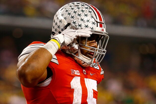 ARLINGTON, TX - JANUARY 12:  Running back Ezekiel Elliott #15 of the Ohio State Buckeyes celebrates after he scores a 9-yard touchdown run in the second half against the Oregon Ducks during the College Football Playoff National Championship Game at AT&T Stadium on January 12, 2015 in Arlington, Texas.  (Photo by Tom Pennington/Getty Images)