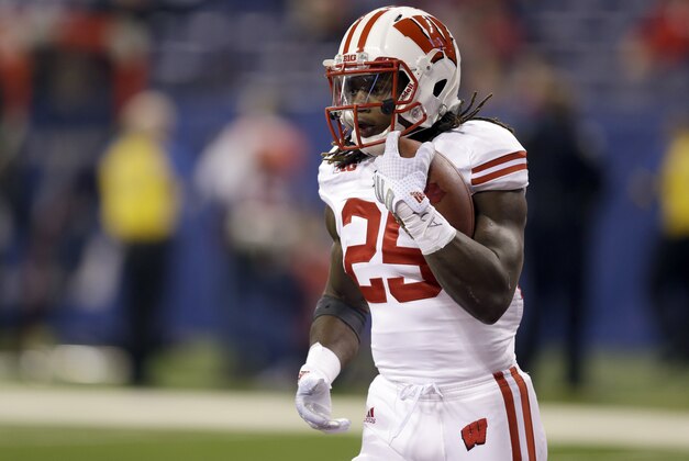 Wisconsin running back Melvin Gordon warms up before the start of the Big Ten Conference championship NCAA college football game between Ohio State and Wisconsin Saturday, Dec. 6, 2014, in Indianapolis. (AP Photo/Michael Conroy)