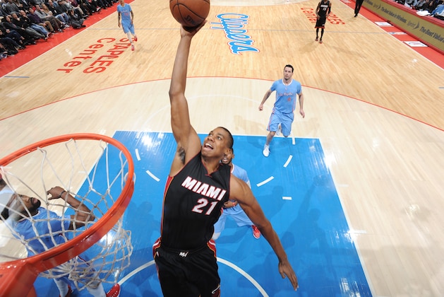 LOS ANGELES, CA -  JANUARY 11: Hassan Whiteside #21 of the Miami Heat goes for the dunk against the Los Angeles Clippers during the game on January 11, 2015 at STAPLES CENTER in Los Angeles, California . NOTE TO USER: User expressly acknowledges and agrees that, by downloading and or using this Photograph, user is consenting to the terms and conditions of the Getty Images License Agreement. Mandatory Copyright Notice: Copyright 2015 NBAE (Photo by Andrew Bernstein/NBAE via Getty Images)