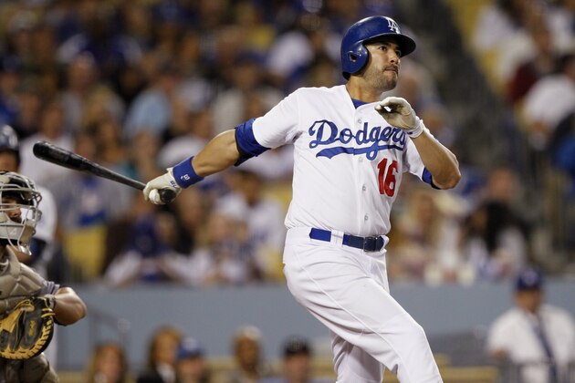Los Angeles Dodgers’ Andre Ethier watches his hit that scored Matt Kemp in the fifth inning of a baseball game against the Colorado Rockies on Saturday, Sept. 27, 2014 in Los Angeles. (AP Photo/Alex Gallardo)