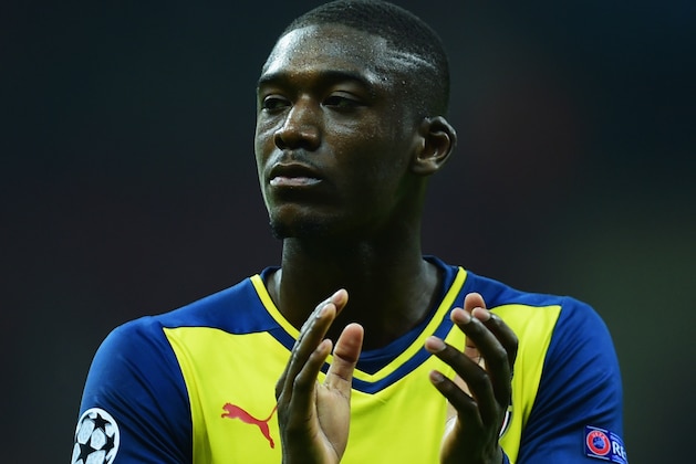 ISTANBUL, TURKEY - DECEMBER 09:  Yaya Sanogo of Arsenal applauds the crowd after victory in the UEFA Champions League Group D match between Galatasaray AS and Arsenal FC at Ali Sami Yen Arena on December 9, 2014 in Istanbul, Turkey.  (Photo by Jamie McDonald/Getty Images)