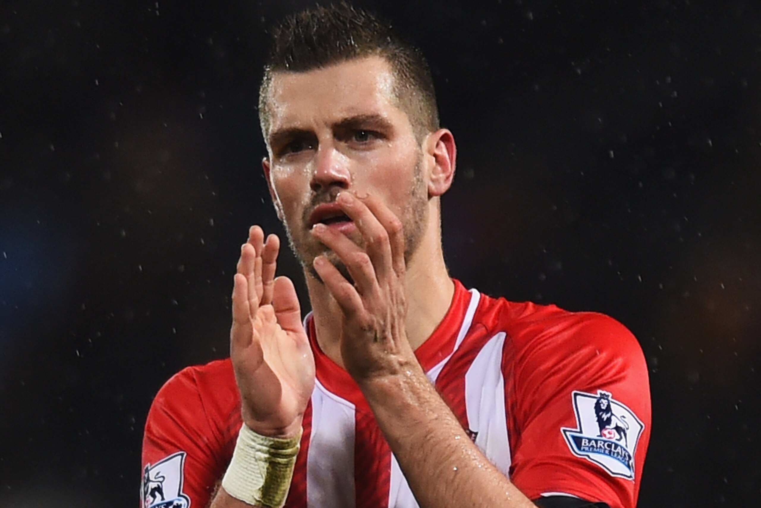 LONDON, ENGLAND - DECEMBER 26:  Morgan Schneiderlin of Southampton applauds the travelling fans after the Barclays Premier League match between Crystal Palace and Southampton at Selhurst Park on December 26, 2014 in London, England.  (Photo by Christopher Lee/Getty Images)