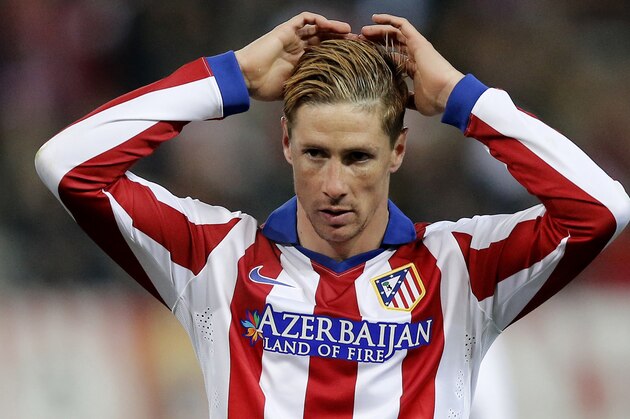 Atletico's Fernando Torres reacts during a King's Cup soccer match between Atletico de Madrid and Real Madrid a at the Vicente Calderon stadium in Madrid, Spain, Wednesday, Jan. 7, 2015 . (AP Photo/Daniel Ochoa de Olza)