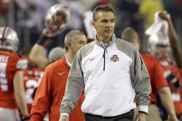 Ohio State head coach Urban Meyer watches before the NCAA college football playoff championship game against Oregon Monday, Jan. 12, 2015, in Arlington, Texas. (AP Photo/LM Otero)