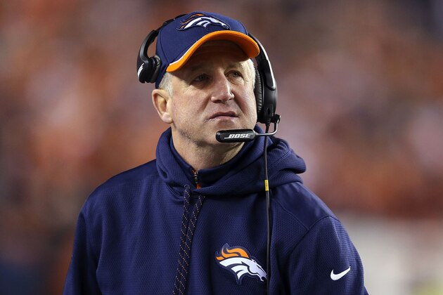 CINCINNATI, OH - DECEMBER 22:  Head Coach John Fox of the Denver Broncos watches a replay as his team takes on the Cincinnati Bengals during the first quarter at Paul Brown Stadium on December 22, 2014 in Cincinnati, Ohio. (Photo by Andy Lyons/Getty Images)