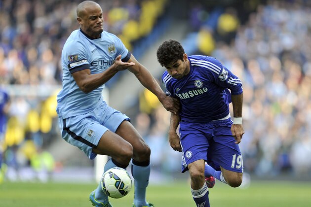 Manchester City's Vincent Kompany left, and Chelsea's Diego Costa battle for the ball during their English Premier League soccer match at the Etihad Stadium in Manchester, England, Sunday Sept. 21, 2014. (AP Photo/Clint Hughes) Manchester City's Vincent Kompany left, and Chelsea's Diego Costa battle for the ball during their English Premier League soccer match at the Etihad Stadium in Manchester, England, Sunday Sept. 21, 2014. (AP Photo/Clint Hughes)
