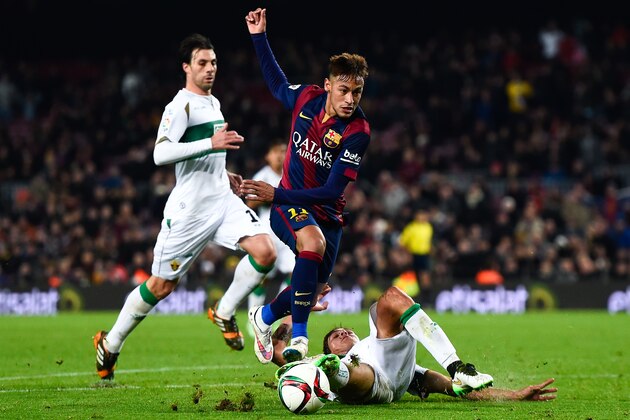 BARCELONA, SPAIN - JANUARY 08:  Neymar of FC Barcelona is brought down by Enzo Roco of Elche FC during the Copa del Rey  Round of 16 First Leg match between FC Barcelona and Elche CF at Camp Nou on January 8, 2015 in Barcelona, Spain.  (Photo by David Ramos/Getty Images)
