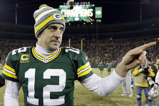 FILE - In this Dec. 28, 2014, file photo, Green Bay Packers' Aaron Rodgers walks off the field after an NFL football game against the Detroit Lions in Green Bay, Wis. The Packers will take on the Seattle Seahawks in the NFC Championship on Sunday, Jan. 18, in Seattle. (AP Photo/Tom Lynn, File)