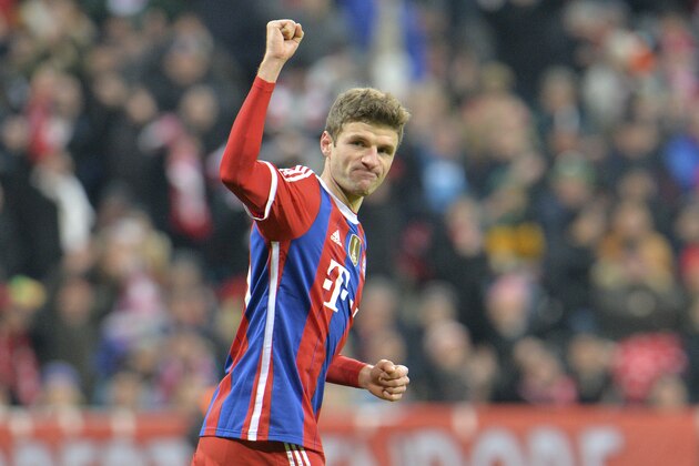 Bayern's Thomas Mueller celebrates after scoring the opening goal during the Champions League group E soccer match between FC Bayern Munich and CSKA Moscow in Munich, Germany, Wednesday, Dec. 10, 2014. (AP Photo/Kerstin Joensson)