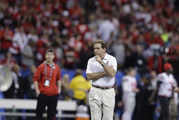 Alabama head coach Nick Saban walks on the field before the Sugar Bowl NCAA college football playoff semifinal game between Alabama and Ohio State, Thursday, Jan. 1, 2015, in New Orleans. (AP Photo/Brynn Anderson)